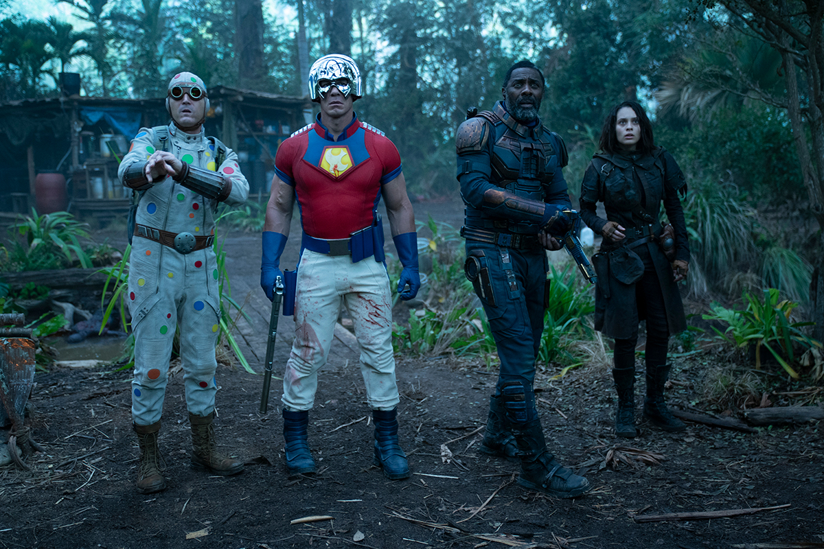 (L-r) DAVID DASTMALCHIAN as Polka Dot Man, JOHN CENA as Peacemaker, IDRIS ELBA as Bloodsport and DANIELA MELCHIOR as Ratcatcher 2 in Warner Bros. Pictures’ action adventure “THE SUICIDE SQUAD,” a Warner Bros. Pictures release.