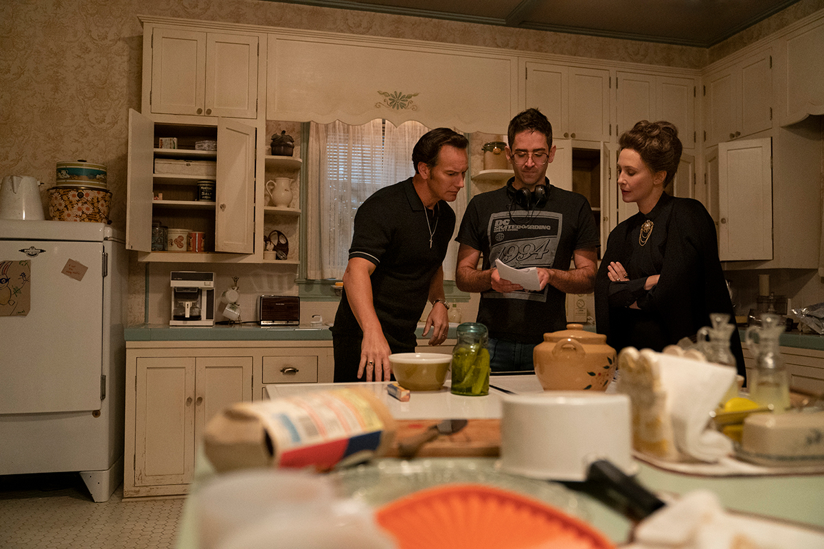 (L-r) PATRICK WILSON, director MICHAEL CHAVES and VERA FARMIGA on the set of New Line Cinema’s horror film “THE CONJURING: THE DEVIL MADE ME DO IT,” a Warner Bros. Pictures release.