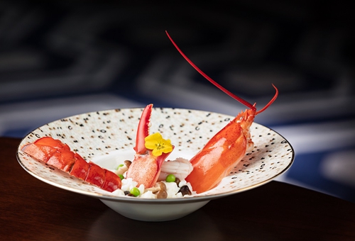 La Chine – Stir-fried Boston lobster, wild mushroom and white truffle oil with scrambled egg whites