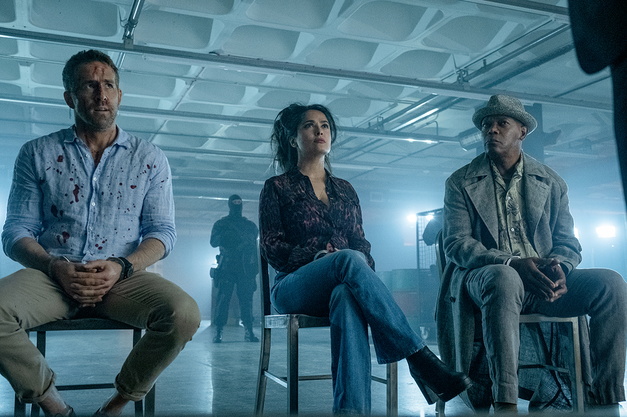 Ryan Reynolds (left) as ’Michael Bryce,’ Salma Hayek as ’Sonia Kincaid,’ and Samuel L Jackson (right) as ’Darius Kincaid’ in THE HITMAN’S WIFE’S BODYGUARD. 