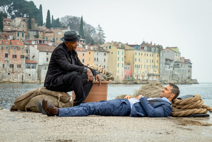 Samuel L Jackson as ‘Darius Kincaid’ and Ryan Reynolds as ‘Michael Bruce’ in THE HITMAN’S WIFE’S BODYGUARD.