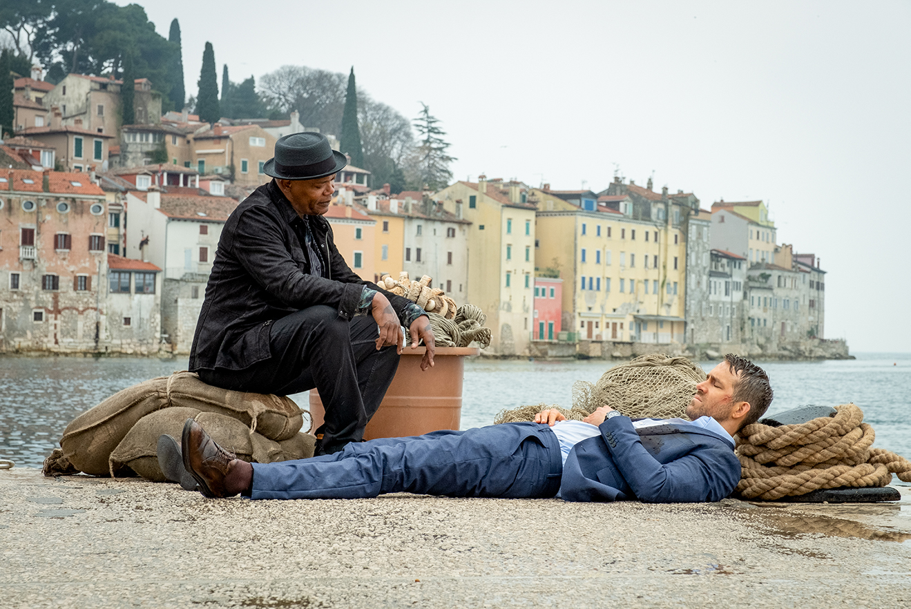 Samuel L Jackson as ‘Darius Kincaid’ and Ryan Reynolds as ‘Michael Bruce’ in THE HITMAN’S WIFE’S BODYGUARD.