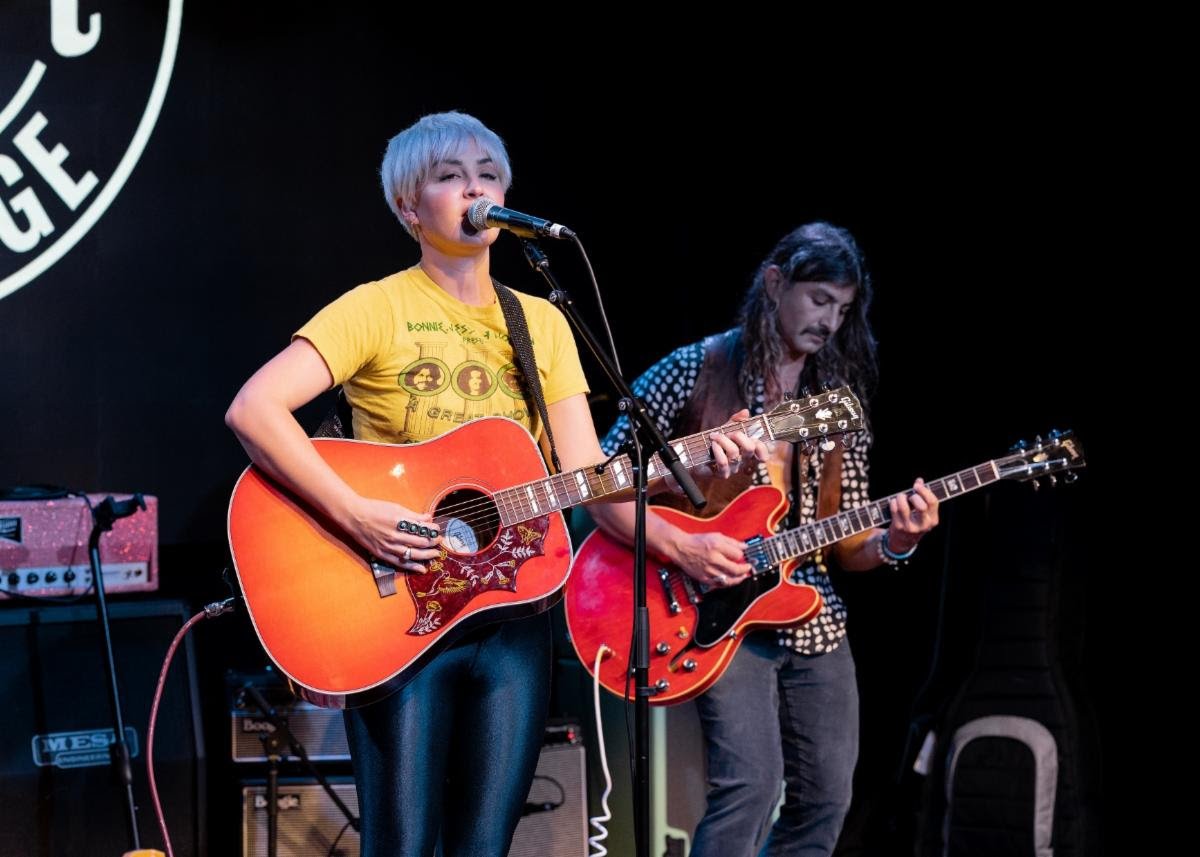 Maggie Rose performs at the Gibson Garage grand opening