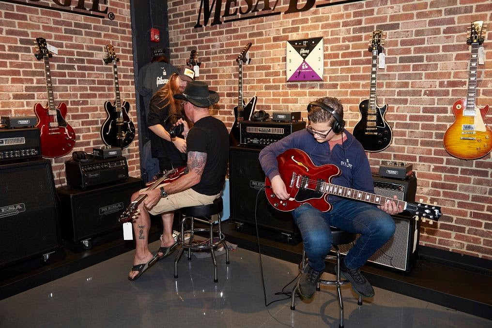 Music fans in the MESA Boogie section of the Gibson Garage