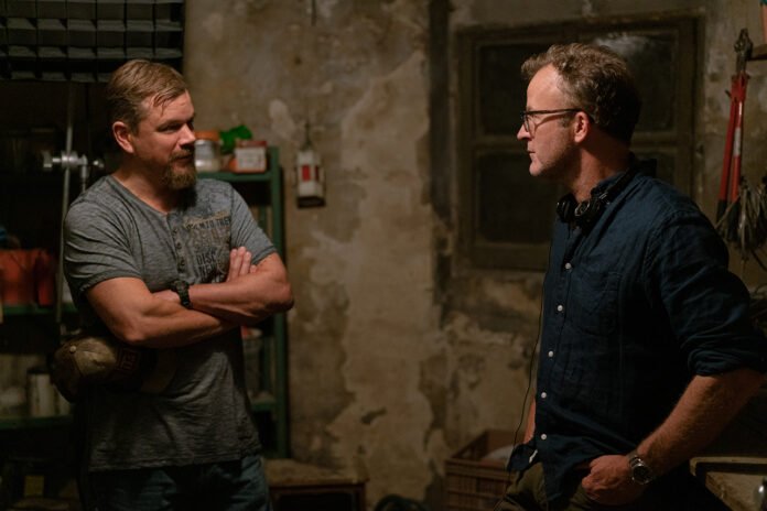 Actor Matt Damon (left) and director Tom McCarthy (right) on the set of STILLWATER, a Focus Features release.