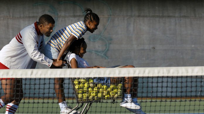 (L-r) WILL SMITH as Richard Williams, DEMI SINGLETON as Serena Williams and SANIYYA SIDNEY as Venus Williams in Warner Bros. Pictures’ inspiring drama “KING RICHARD,” a Warner Bros. Pictures release.