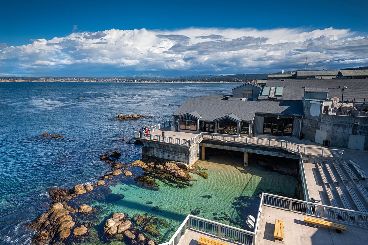 Scenic shot of the Great Tide Pool and exterior back deck of the Monterey Bay Aquarium. ©Monterey Bay Aquarium