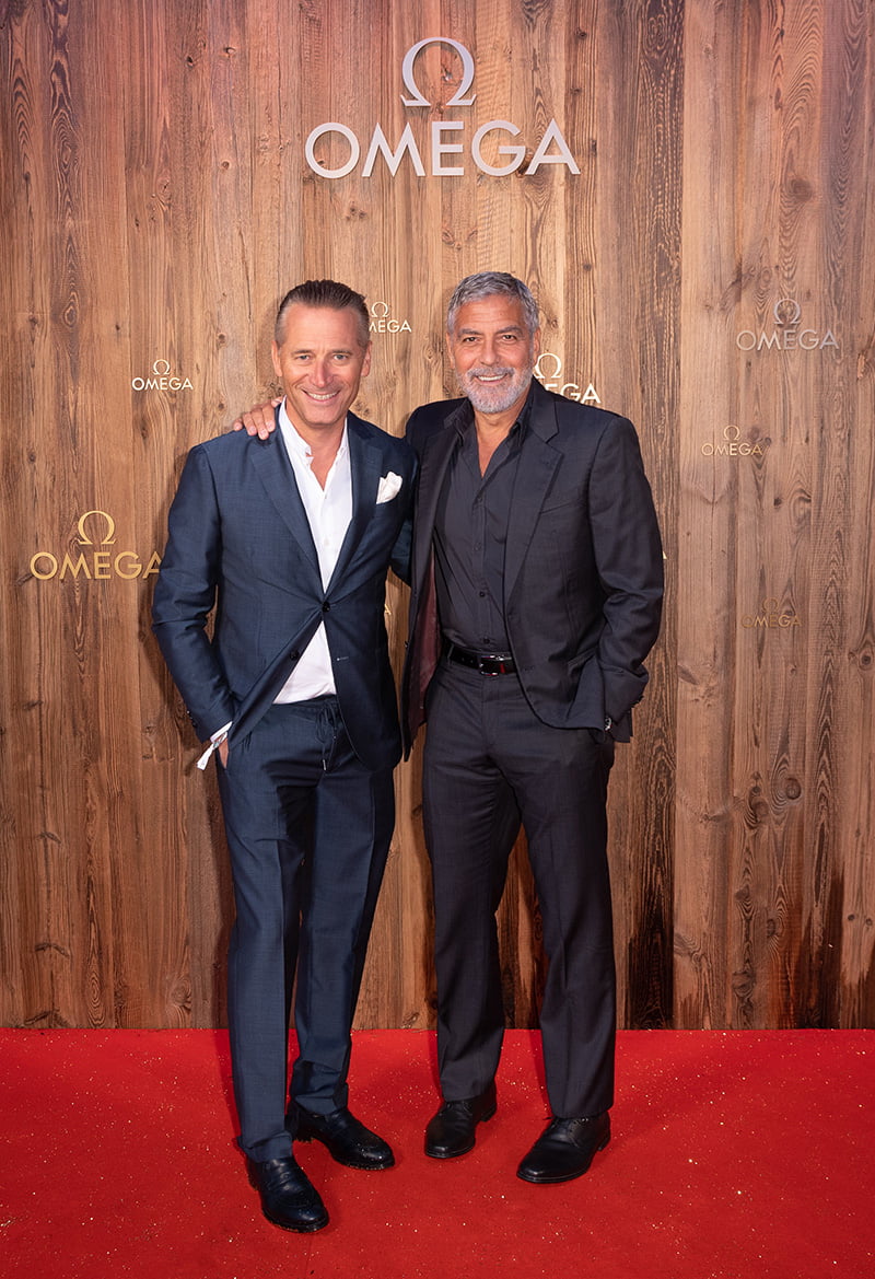 George Clooney  and Raynald Aeschlimann, President and CEO of OMEGA,at OMEGA Masters event in Cry D’Er