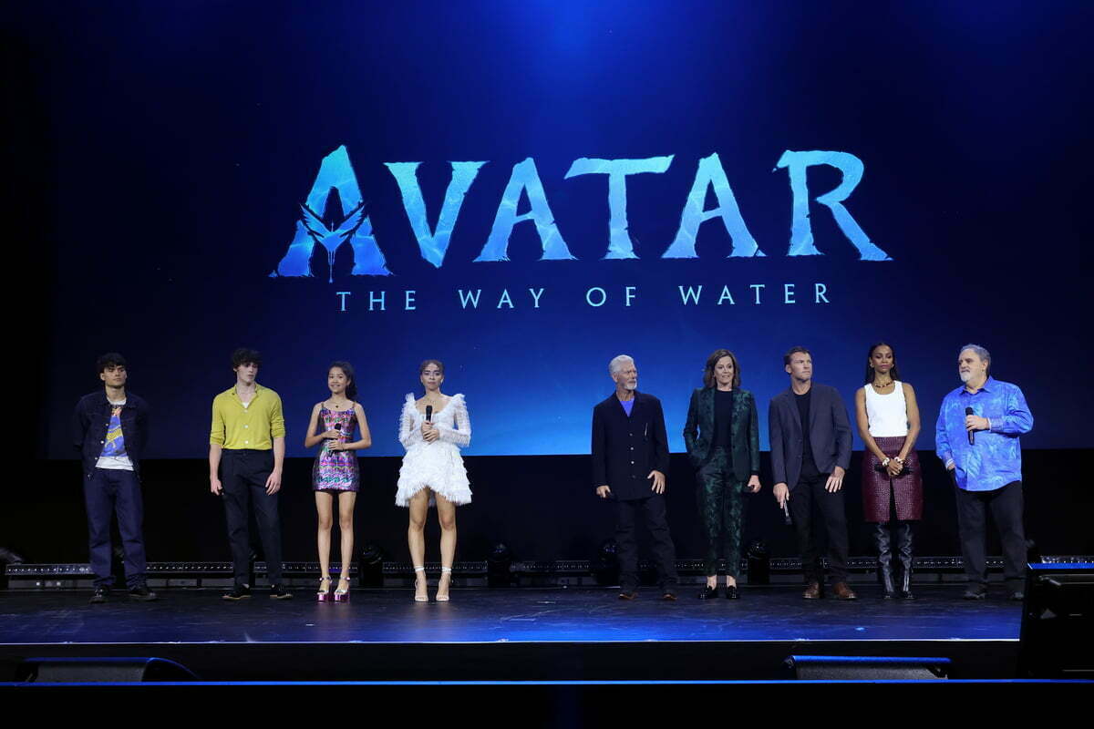 ANAHEIM, CALIFORNIA - SEPTEMBER 10: (L-R) Jamie Flatters, Jack Champion, Trinity Bliss, Bailey Bass, Stephen Lang, Sigourney Weaver, Sam Worthington, Zoe Saldana, and Jon Landau speak onstage during D23 Expo 2022 at Anaheim Convention Center in Anaheim, California on September 10, 2022.