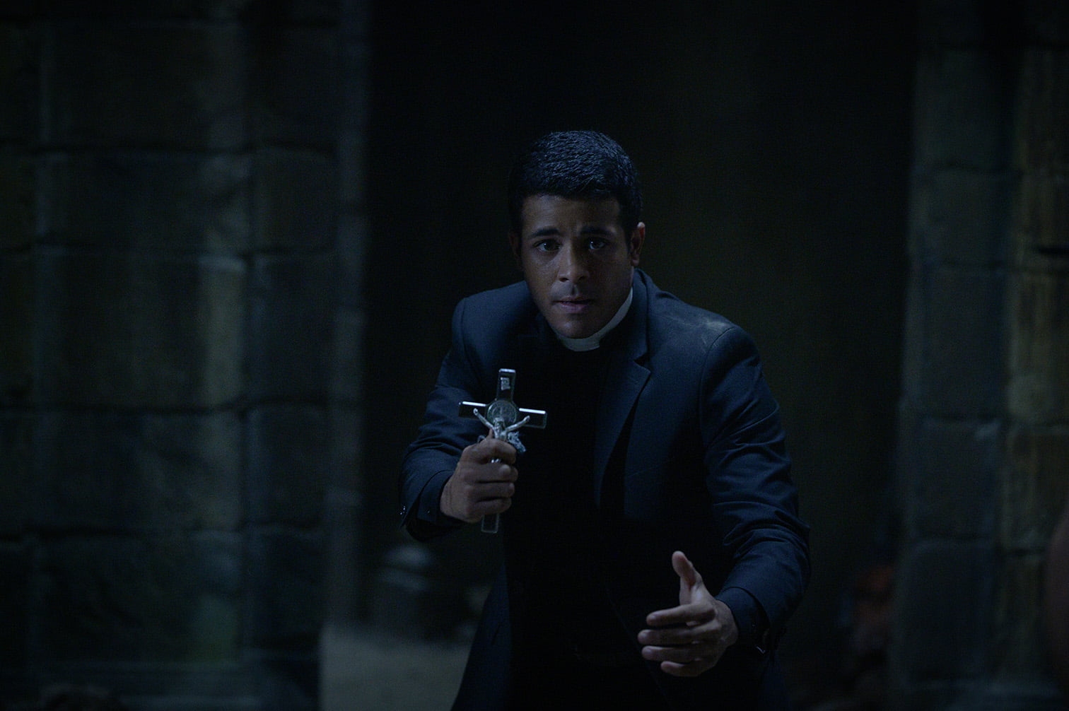 Christian Navarro (“Father Dante”) in PREY FOR THE DEVIL