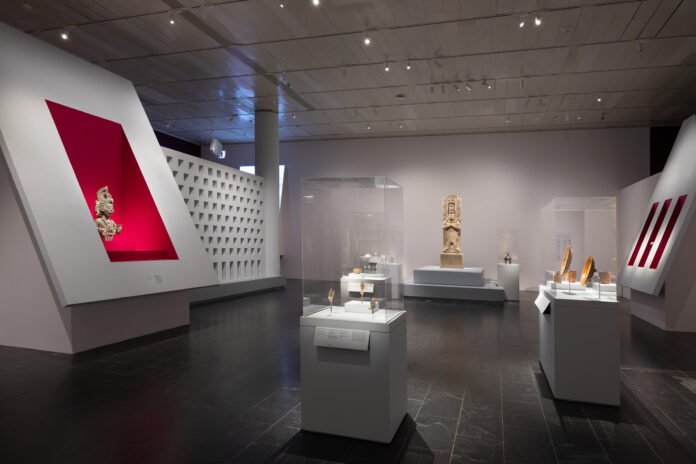 Installation view of Lives of the Gods: Divinity In Maya Art, on view November 21, 2022 – April 2, 2023.