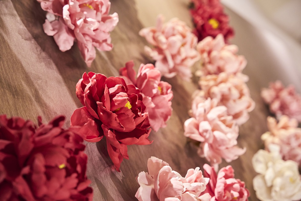 Ceramic peony art installation at The Verandah Foyer