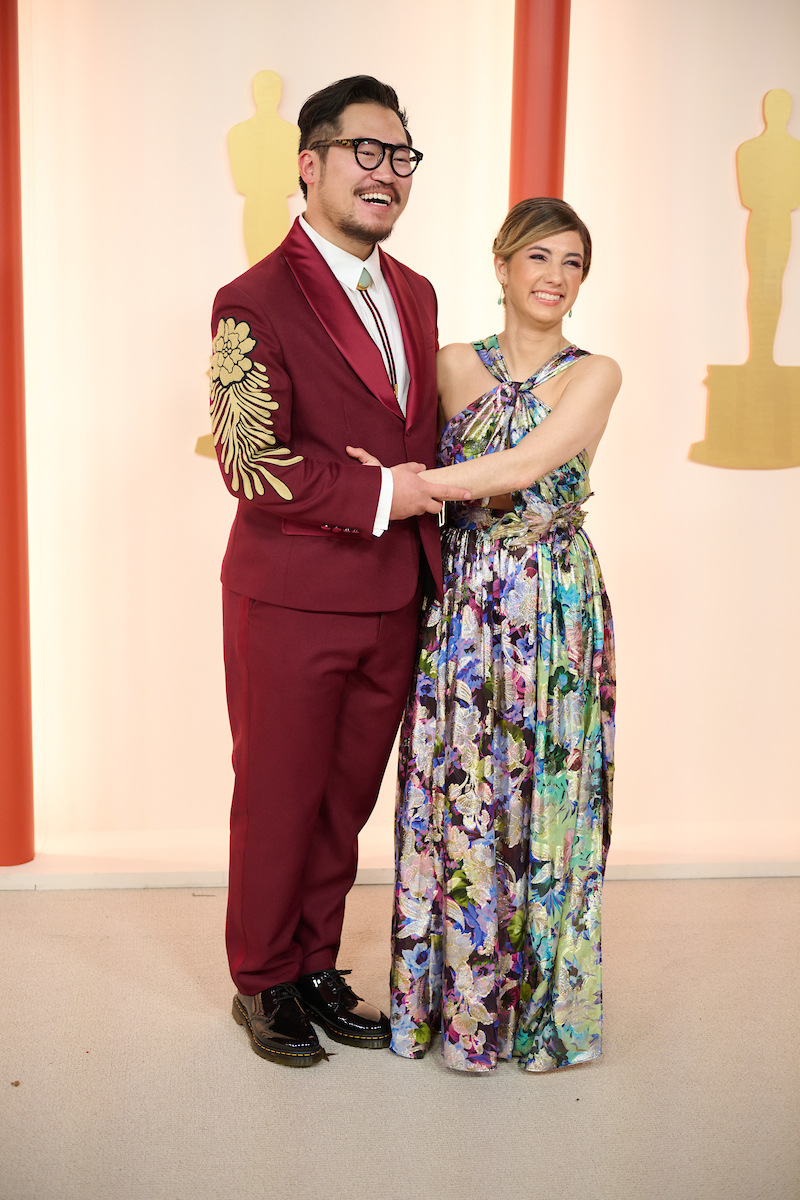 Oscar® nominee Daniel Kwan arrives with guest on the red carpet of The 95th Oscars® at the Dolby® Theatre at Ovation Hollywood on Sunday, March 12, 2023.