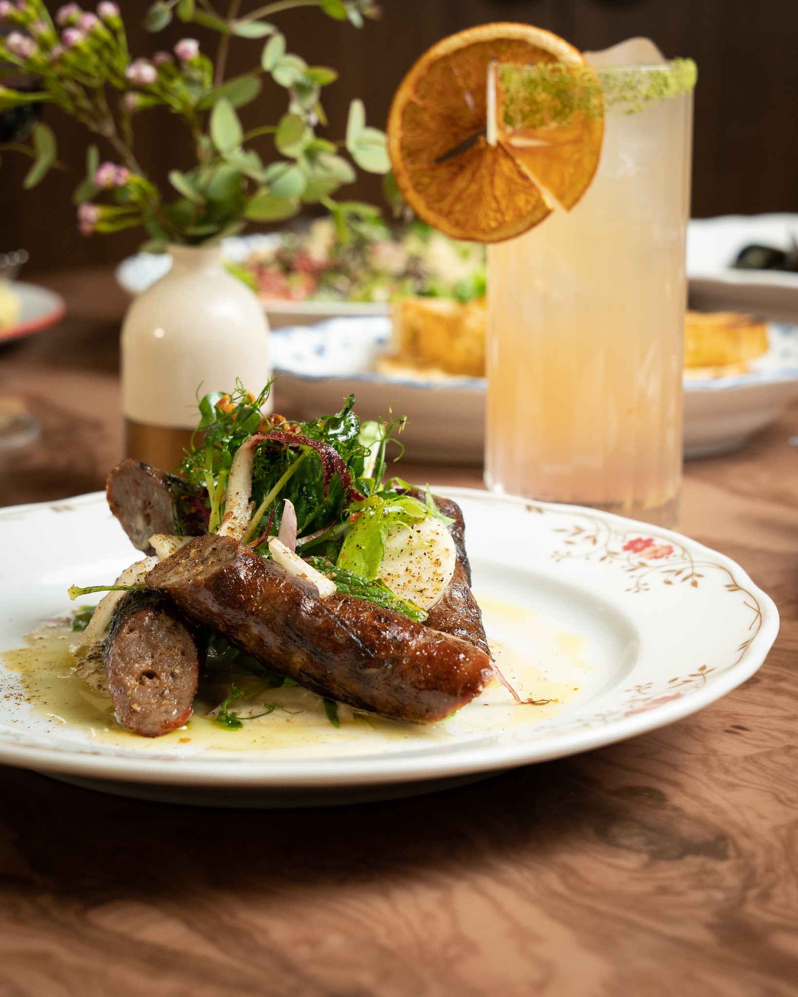 Grilled Lamb Sausage – Almonds, charred eggplant, snap peas, mint - Balla Italian Soul at SAHARA Las Vegas