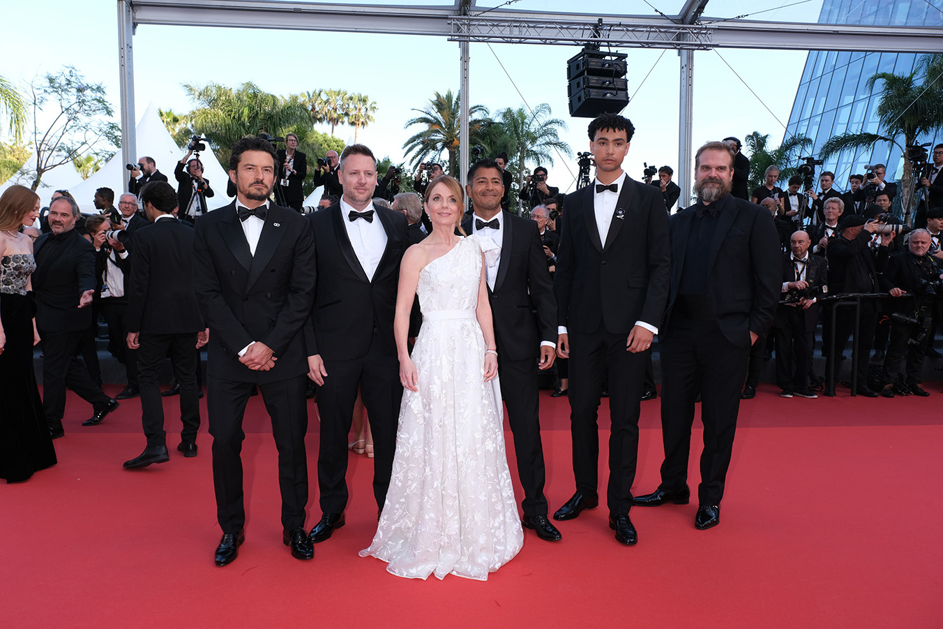 CANNES, FRANCE - MAY 27: (l to r) Orlando Bloom, director Neill Blomkamp, Geri Halliwell Horner, producer Asad Qizilbash, Archie Madekwe and David Harbour from Sony Pictures GRAN TURISMO: THE MOVIE attend the closing night Red Carpet during the 76th annual Cannes Film Festival at Palais des Festivals on May 27, 2023 in Cannes, France. 