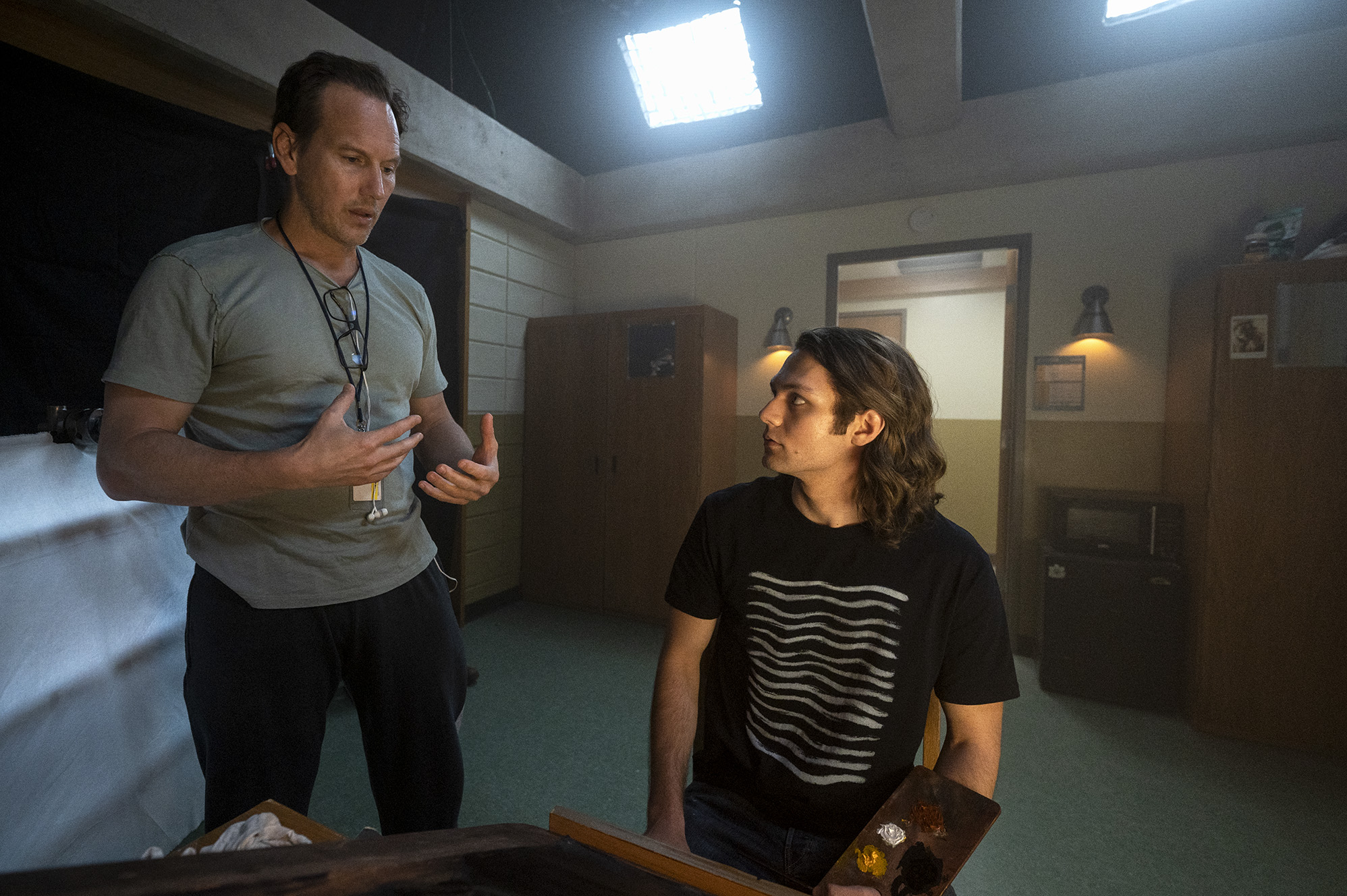 BTS of Patrick Wilson and Ty Simpkins on the set of Screen Gems Insidious: The Red Door