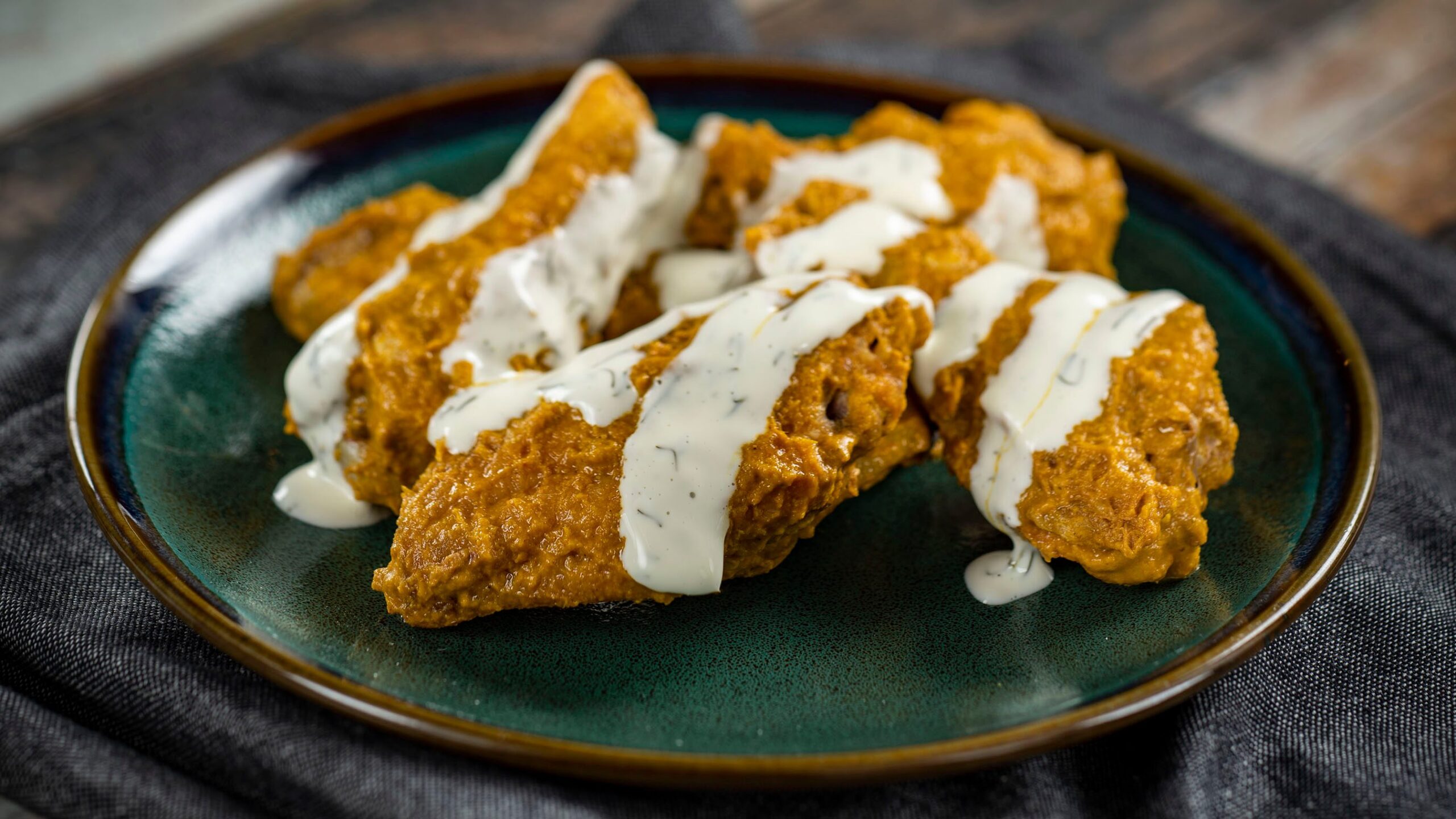 Scotch Bonnet Pepper-Curry Wings with Cool Cucumber Yogurt at Brew-Wing Lab at the Odyssey