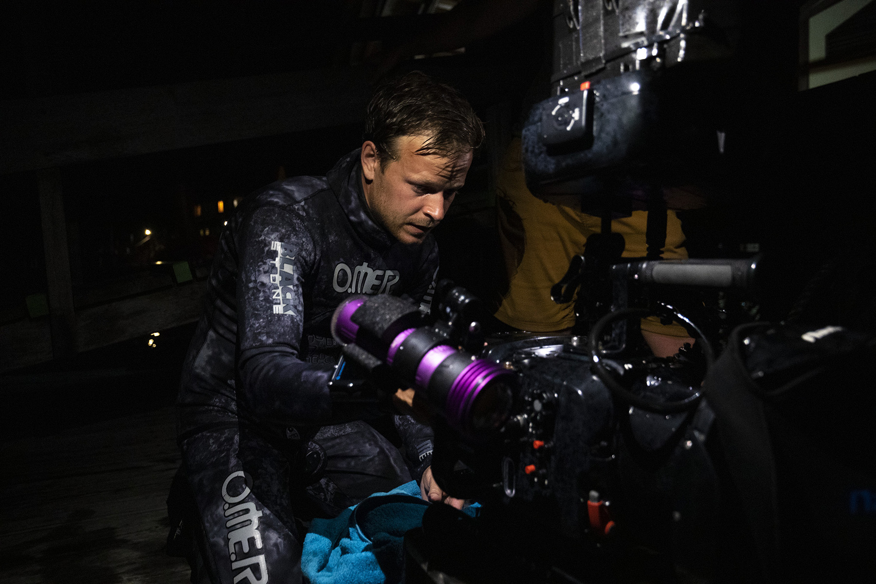 Bertie Gregory with his kit at night.