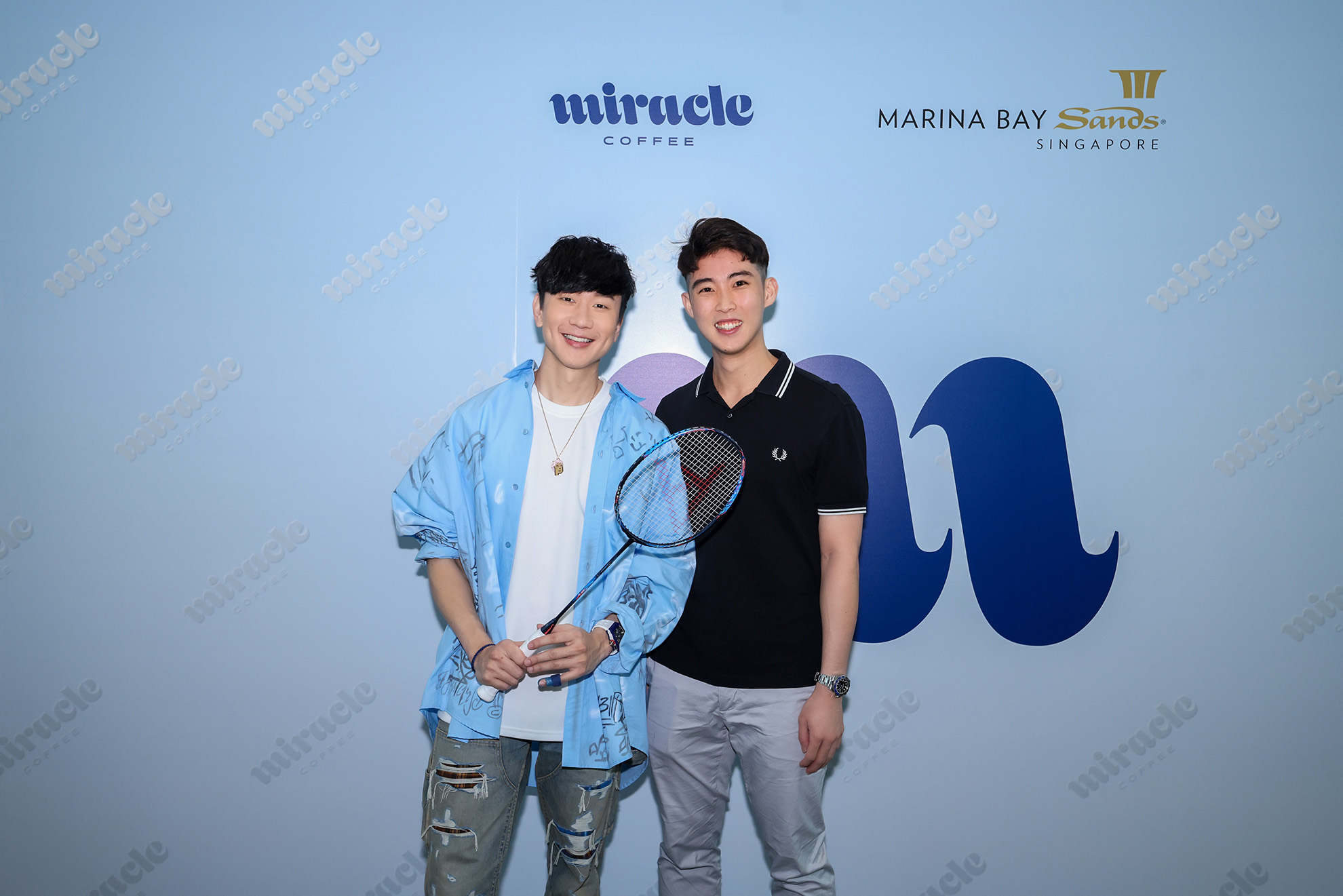 JJ Lin with national badminton player Loh Kean Yew