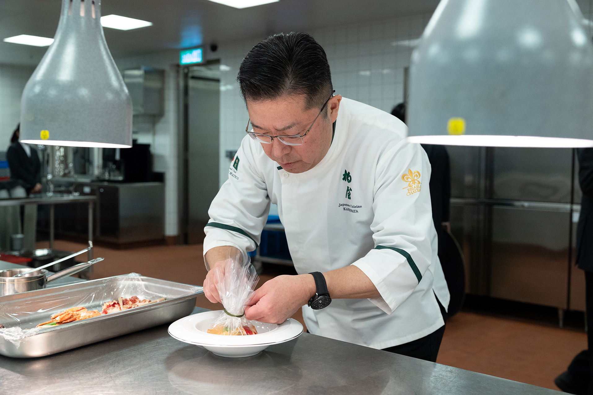 Chef Hideaki Matsuo in kitchen at The Grand Pavilion of the Grand Lisboa Palace Resort Macau - The MICHELIN Star Studded Dinner – Timeless Gastronomy