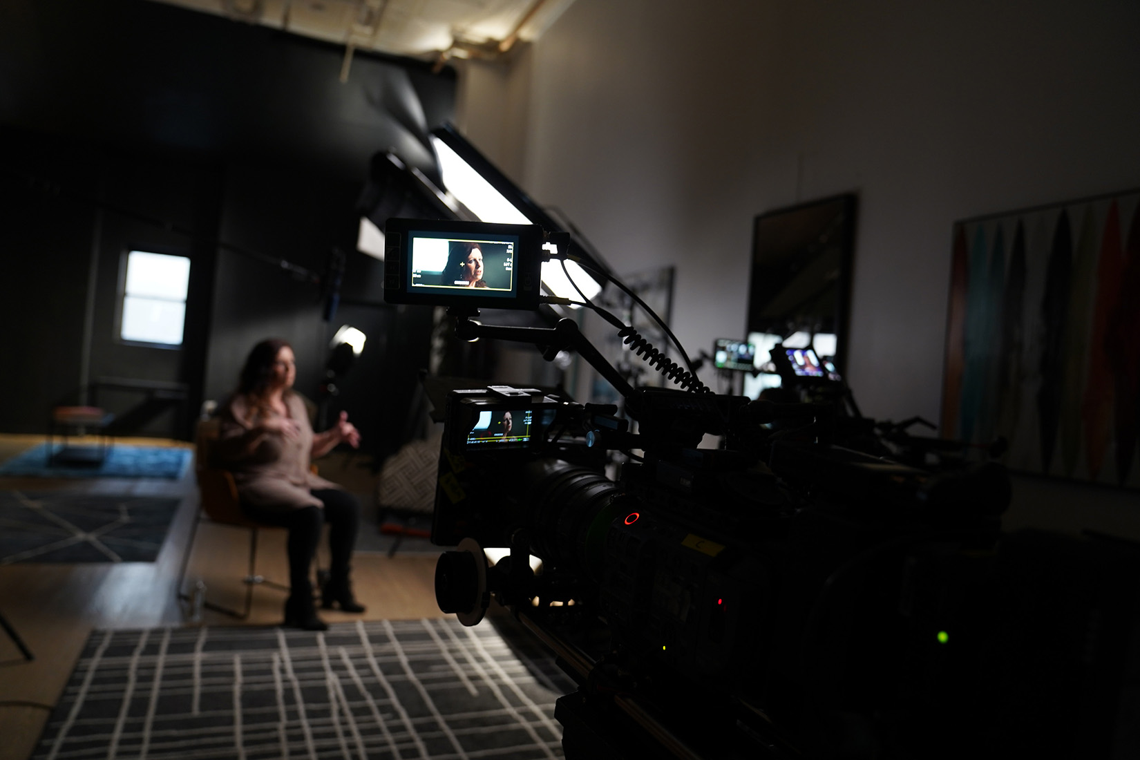 In this behind-the-scenes photo, member of the 4th Eye Corporation "Elora" is interviewed for "Killer Lies: Chasing a True Crime Con Man," a documentary series about obsession and deception, following the unraveling of Stephane Bourgoin's career as a best-selling author and serial killer expert. “Elora” is a pseudonym; she chose to remain anonymous.