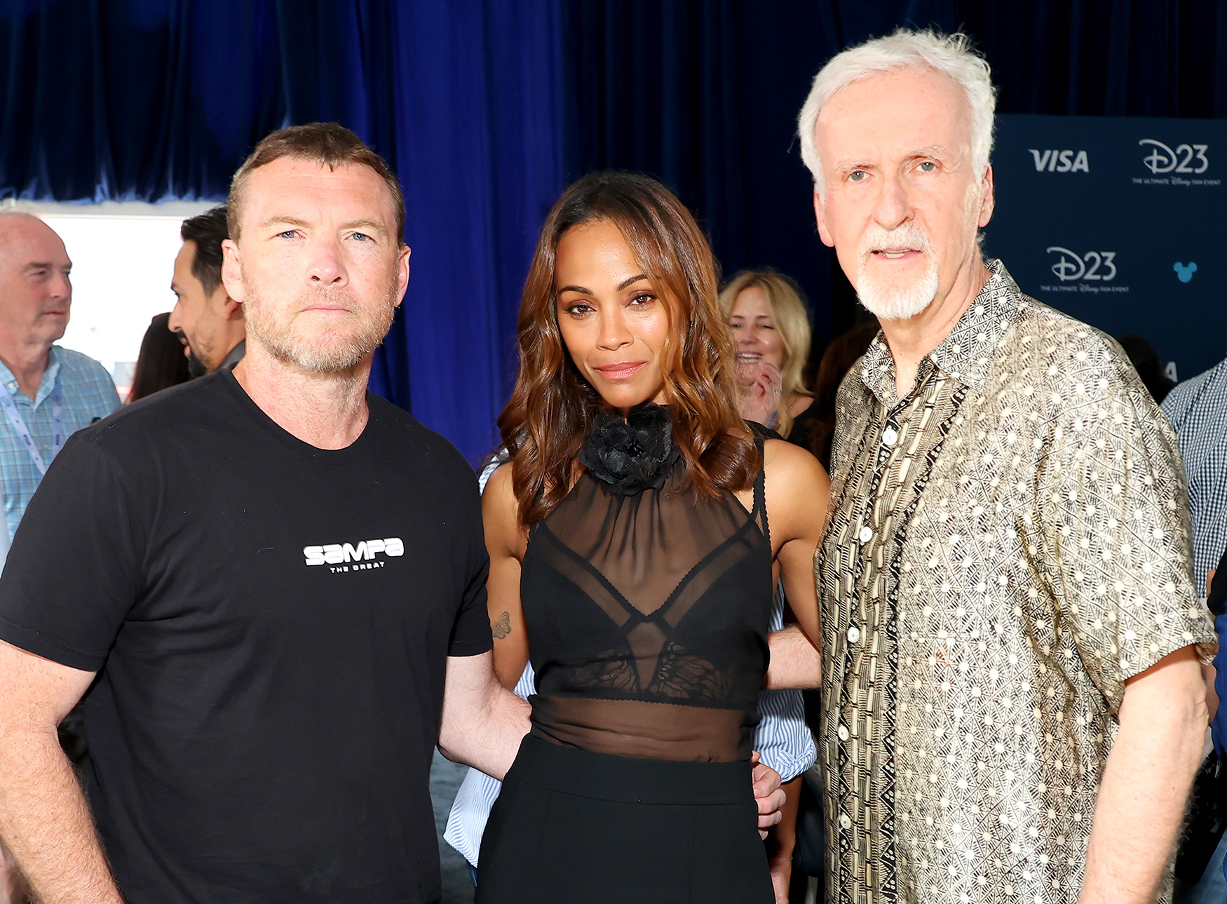 (L-R) Sam Worthington, Zoe Saldana and James Cameron at D23: The Ultimate Disney Fan Event in Anaheim, California on August 09, 2024.