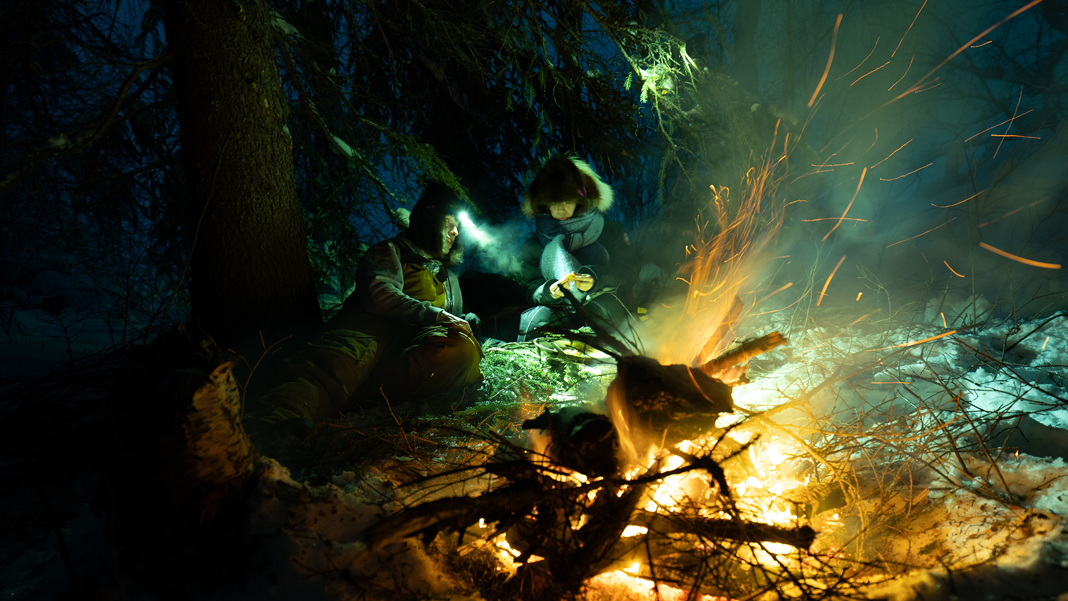 Ricko DeWilde and his daughter, Skarlett enjoy a meal together in the wilderness.