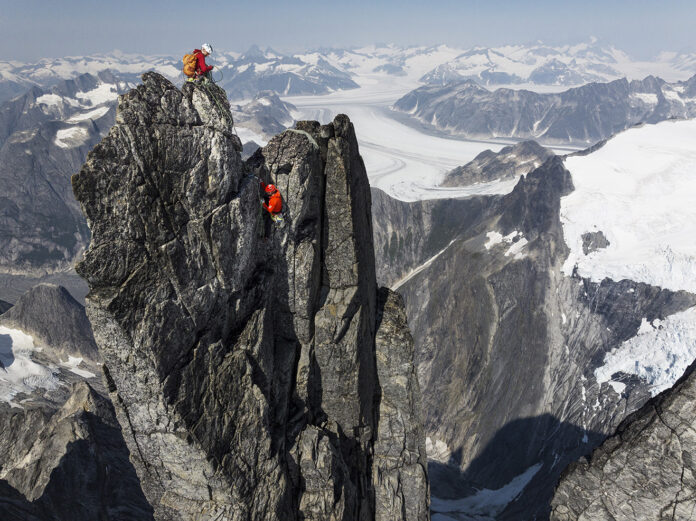 Aerial view of Tommy Caldwell and Alex Honnold on the summit of the West Cat’s Ear Spire.