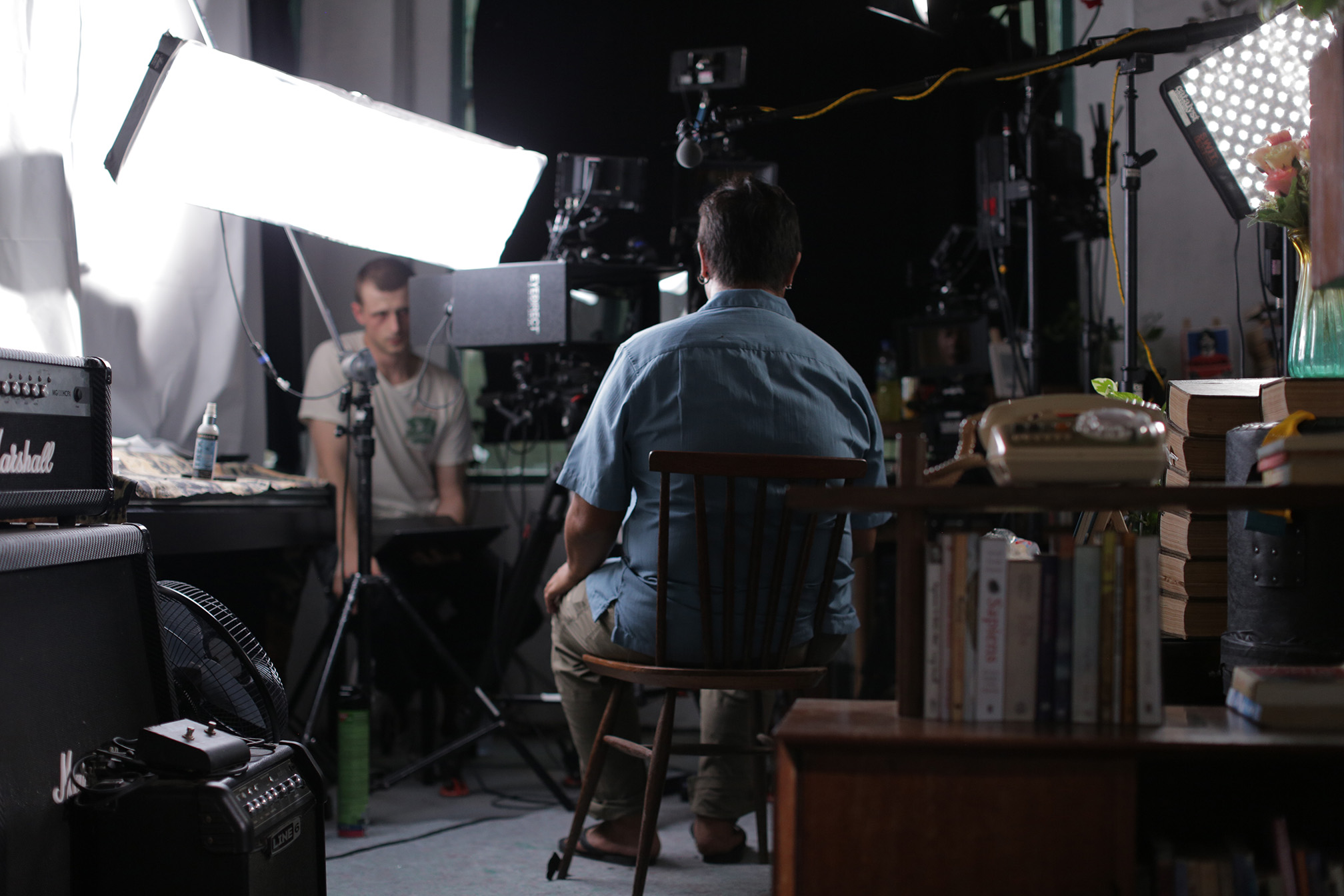 In this behind-the-scenes photo, Series Producer James Parris interviews contributor Dendy Montgomery during the production of “Tsunami: Race Against Time.” When the earthquake started, journalist and videographer Dendy Montgomery films the devastation. When the tsunami followed, he films their escape and races to rescue his own mother. (National Geographic)