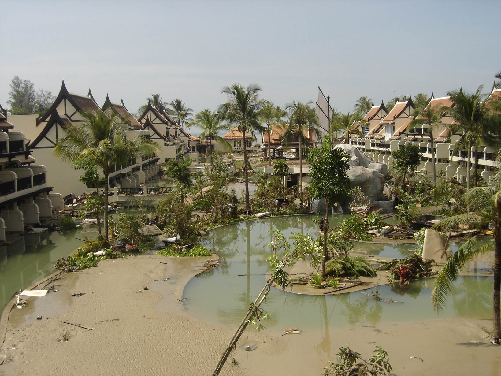 The popular tourist destination of Khao Lak in Thailand is devastated by the force of the tsunami.