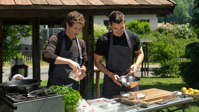 James Marsden and Antoni Porowski make schnitzel.